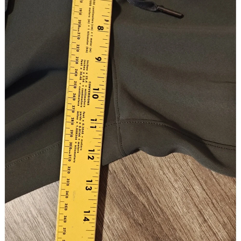 Lululemon On the Fly Jogger Women 10 Green Woven Tapered Pant Drawstring Pocket